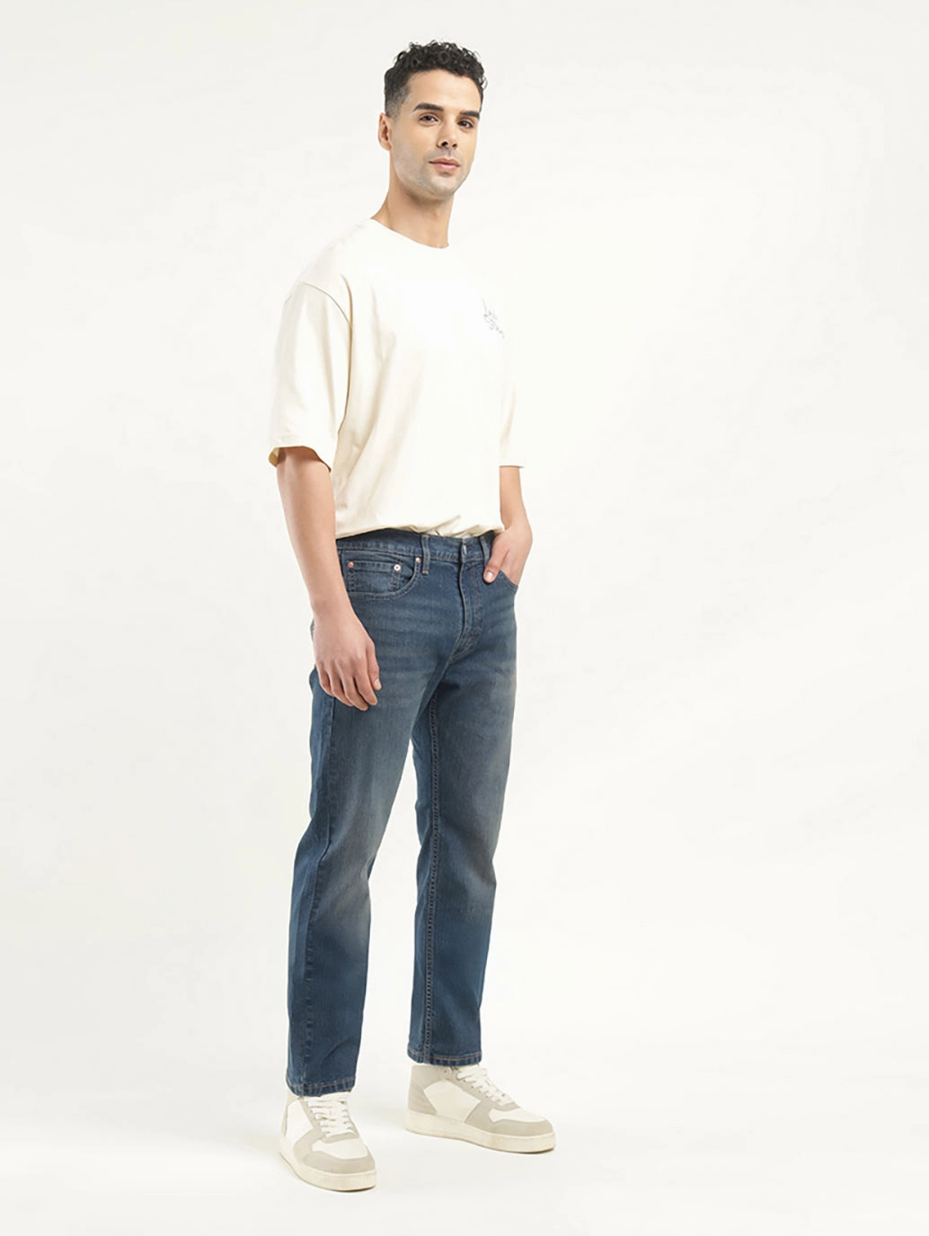 Men's 550 Indigo Relaxed Tapered Fit Mid Rise Jeans