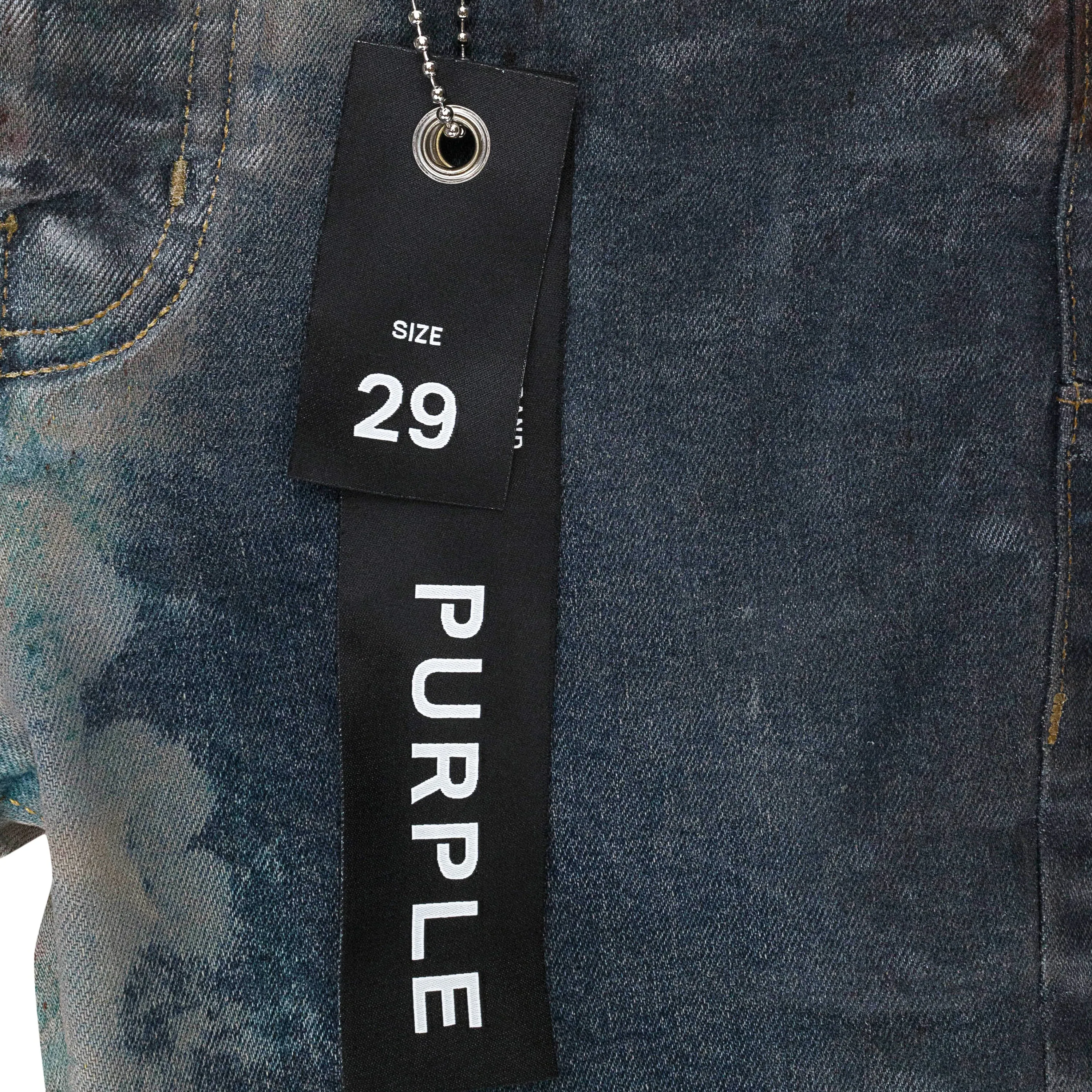 MULTICOLOR-SPRÜH-EFFEKT ÜBER GEBLEICHTE INDIGO SKINNY JEANS