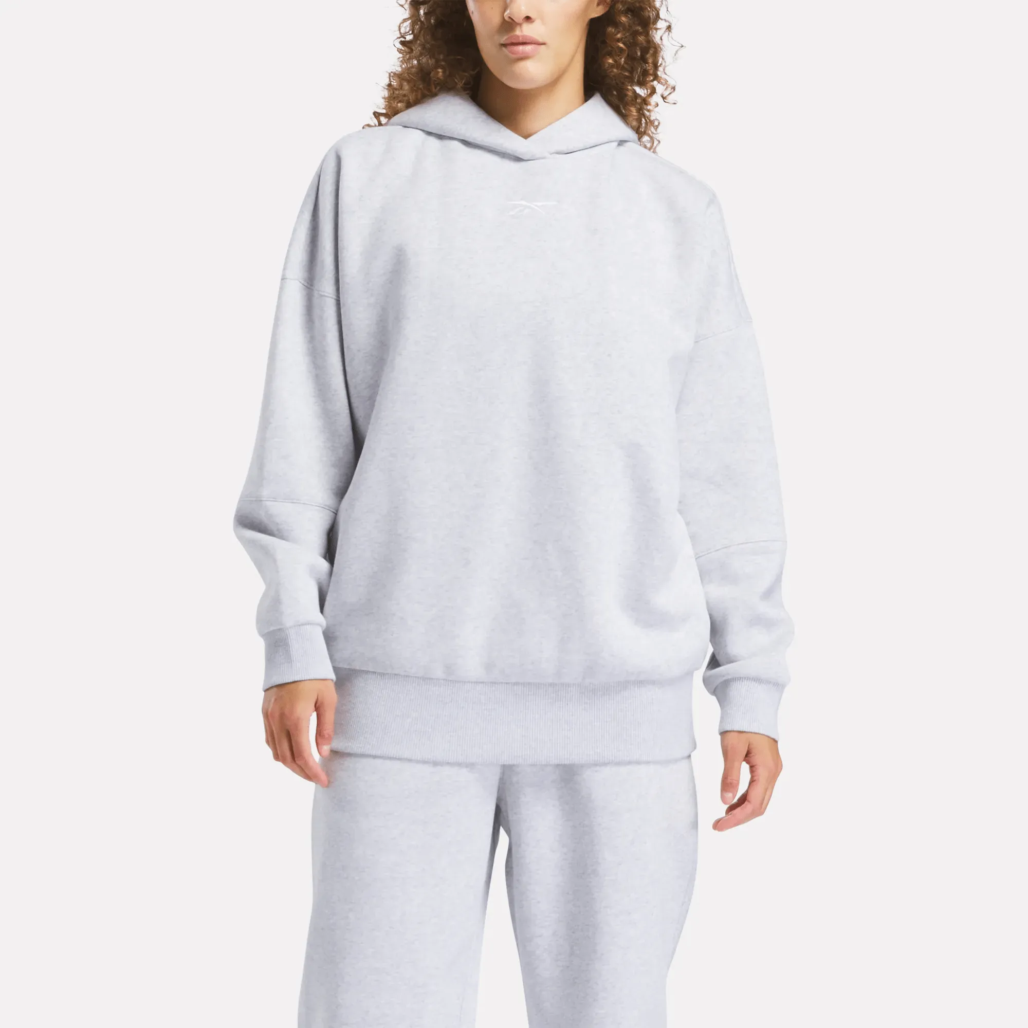 Reebok Damenbekleidung Lux Übergroße Kapuzenjacke